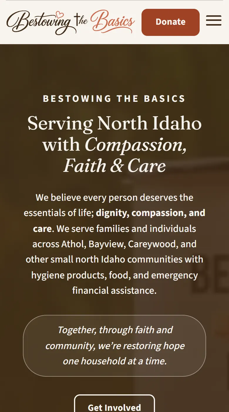 The new Bestowing the Basics homepage on a phone: a compact header with a Donate button, the headline, who they serve in Athol, Bayview and Careywood, and a Get Involved button