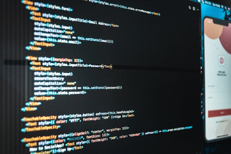 Website programming language on web developers computer screen
